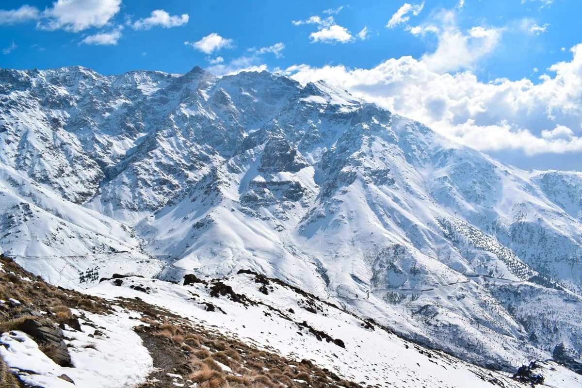 Snow covering the High Atlas peaks near the village of Tacheddirt in winter