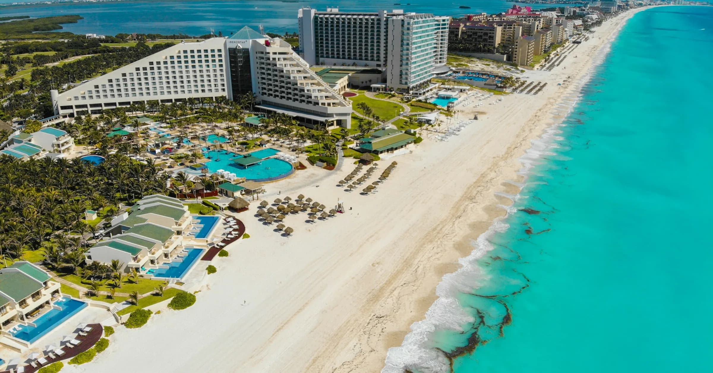Cancún to Tulum: the hotels and beaches of Cancún's Hotel Zone between the lagoon and the Caribbean, seen from above