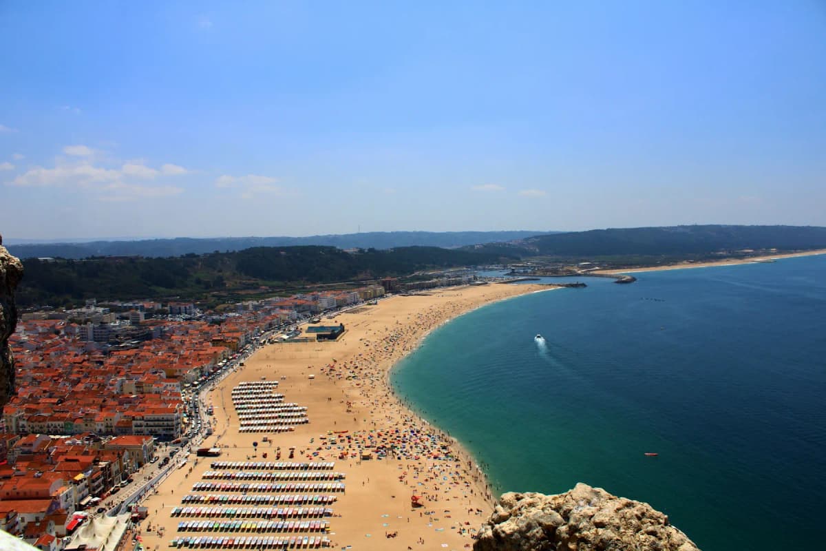 The crescent beach and town of Nazaré seen from the Sítio headland