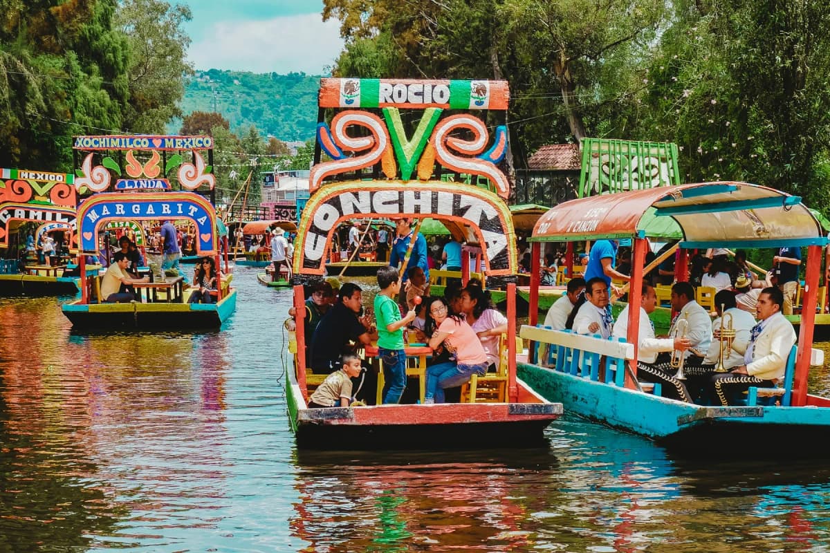 Colourful trajinera boats waiting on a canal at Xochimilco
