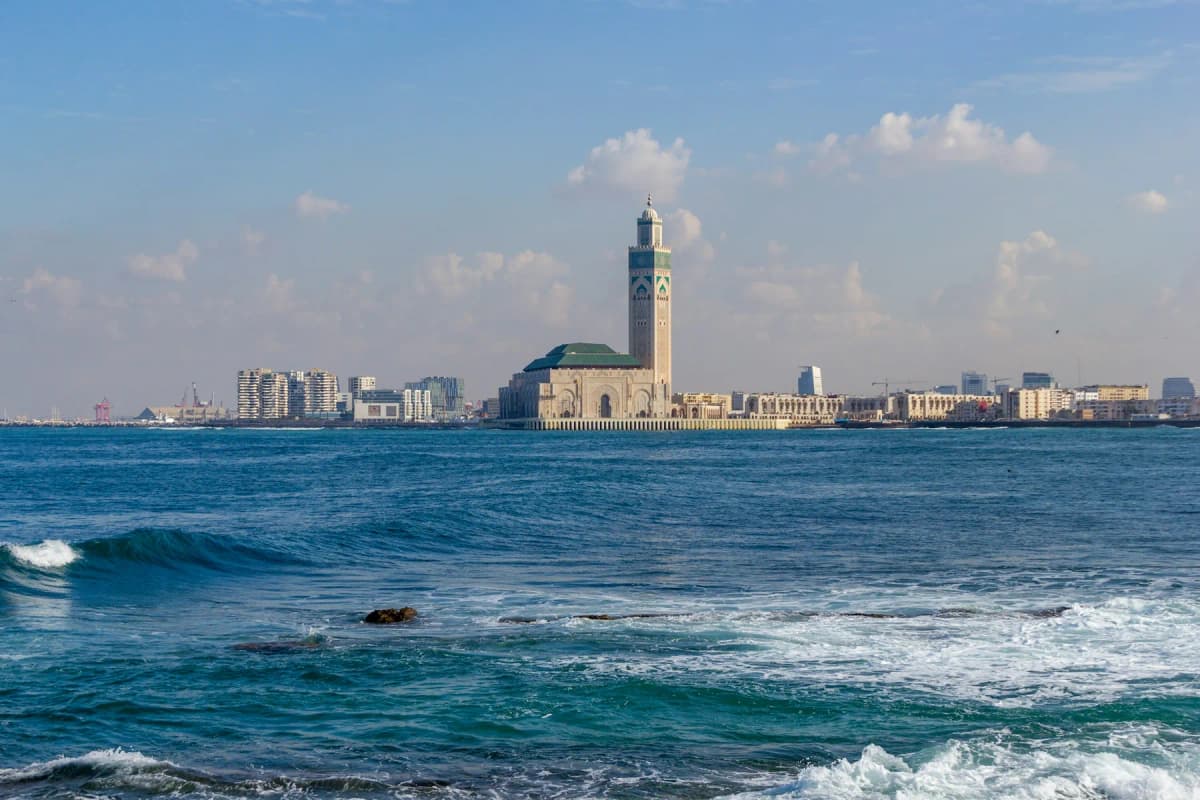 Atlantic waves breaking in front of the Casablanca seafront and the Hassan II Mosque