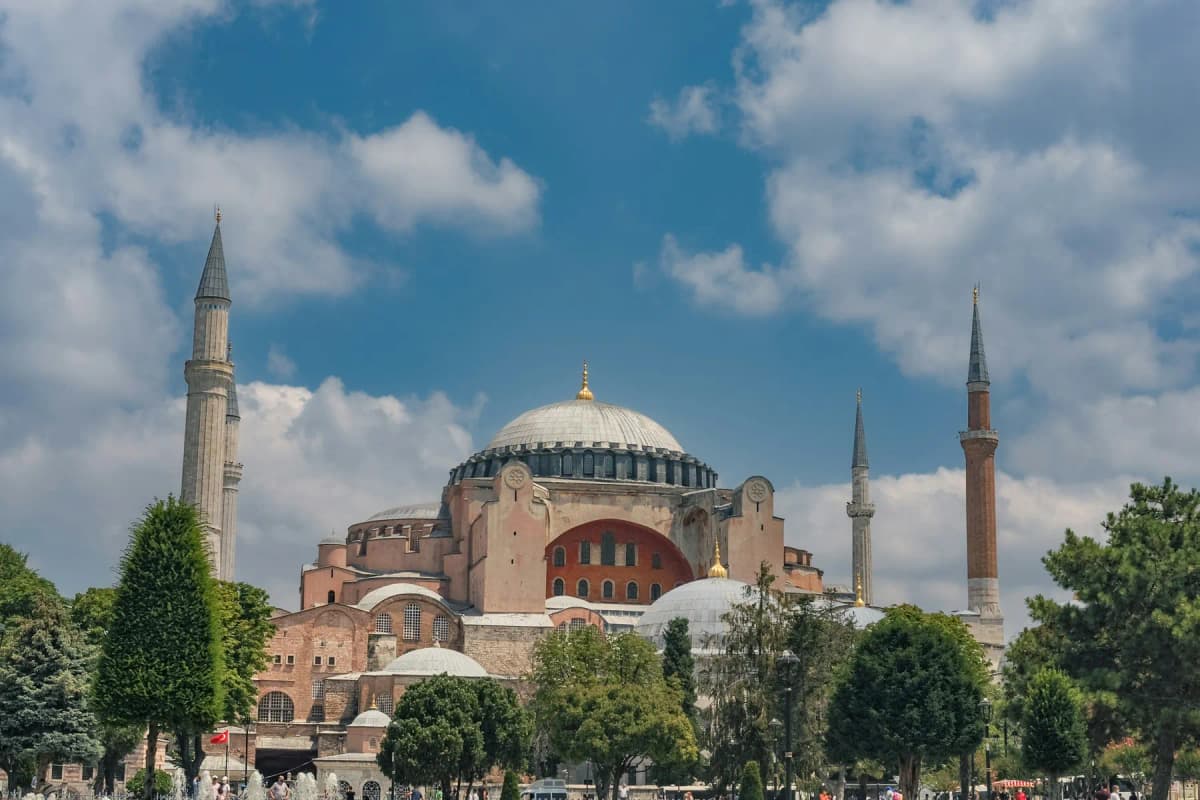 Hagia Sophia and its minarets in Sultanahmet under a blue sky