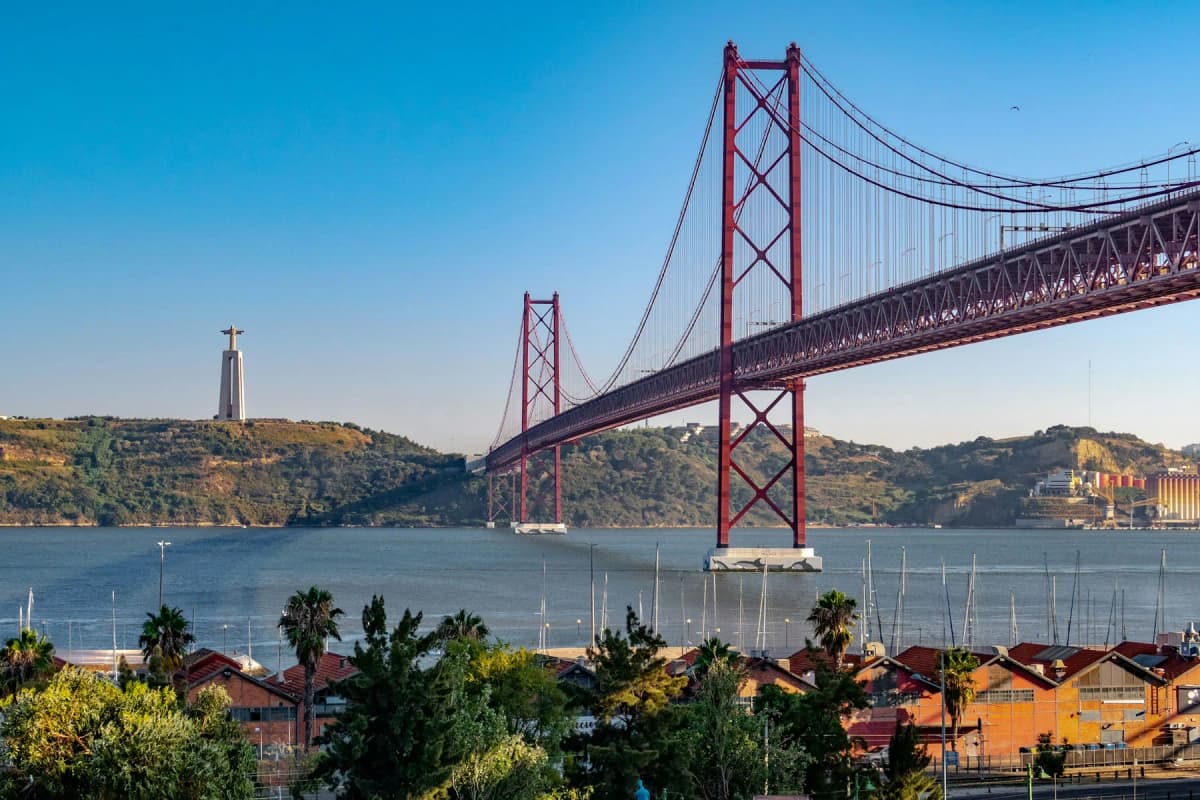 The red Ponte 25 de Abril suspension bridge crossing the Tagus in Lisbon