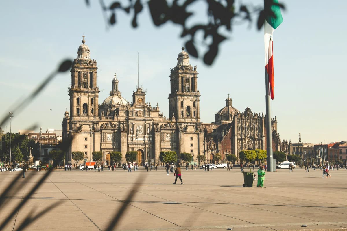 The Metropolitan Cathedral across the Zócalo with the Mexican flag on its pole