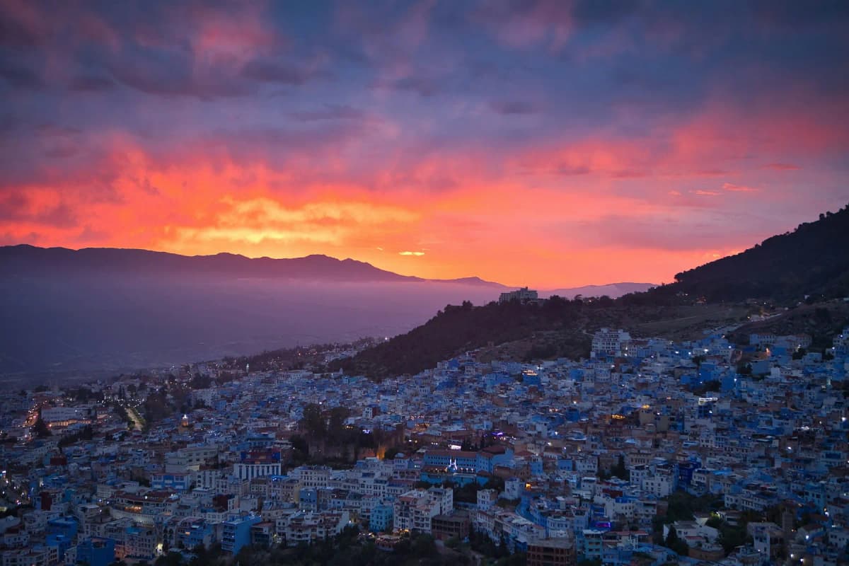 Sunset view over Chefchaouen and the Rif mountains from the hill by the Spanish Mosque