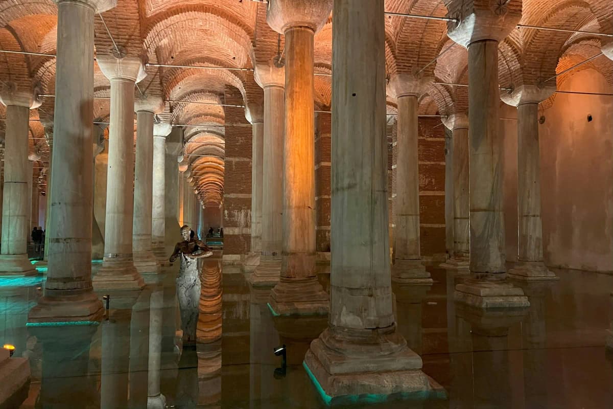 Lit columns rising from the water in the Basilica Cistern in Istanbul