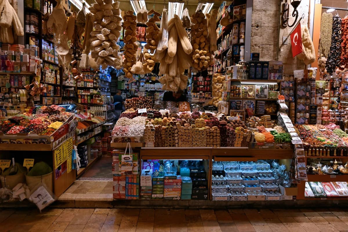 A stall piled with dried fruit, nuts and sweets in an Istanbul bazaar