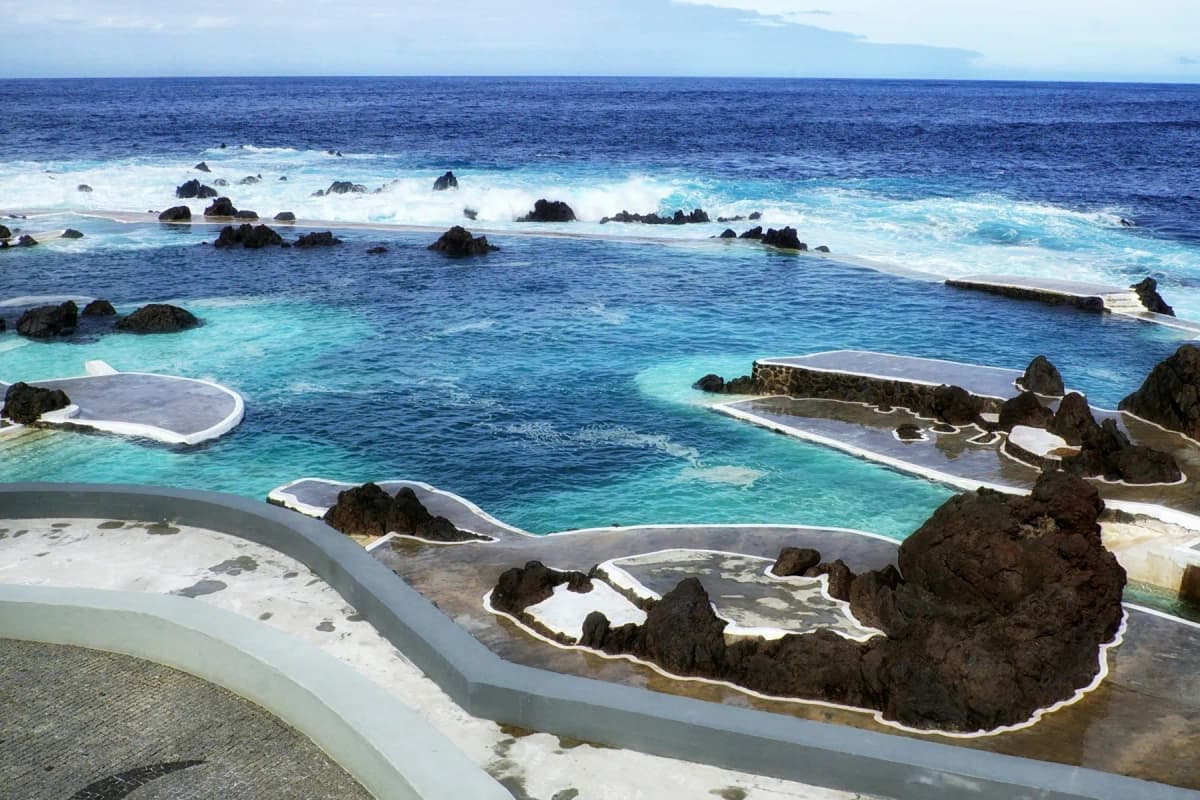 Seawater filling the volcanic rock pools at Porto Moniz on Madeira's north-west coast