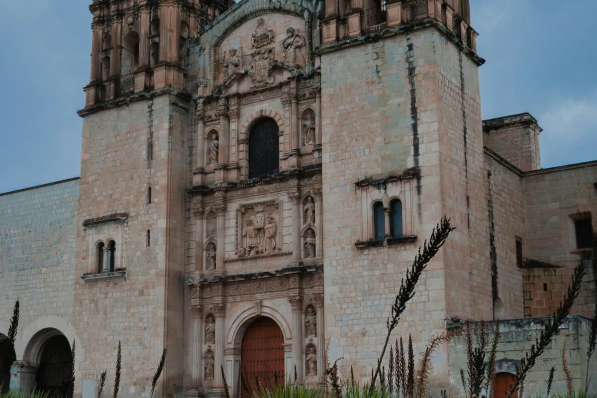 The Baroque stone façade of the Templo de Santo Domingo in Oaxaca City