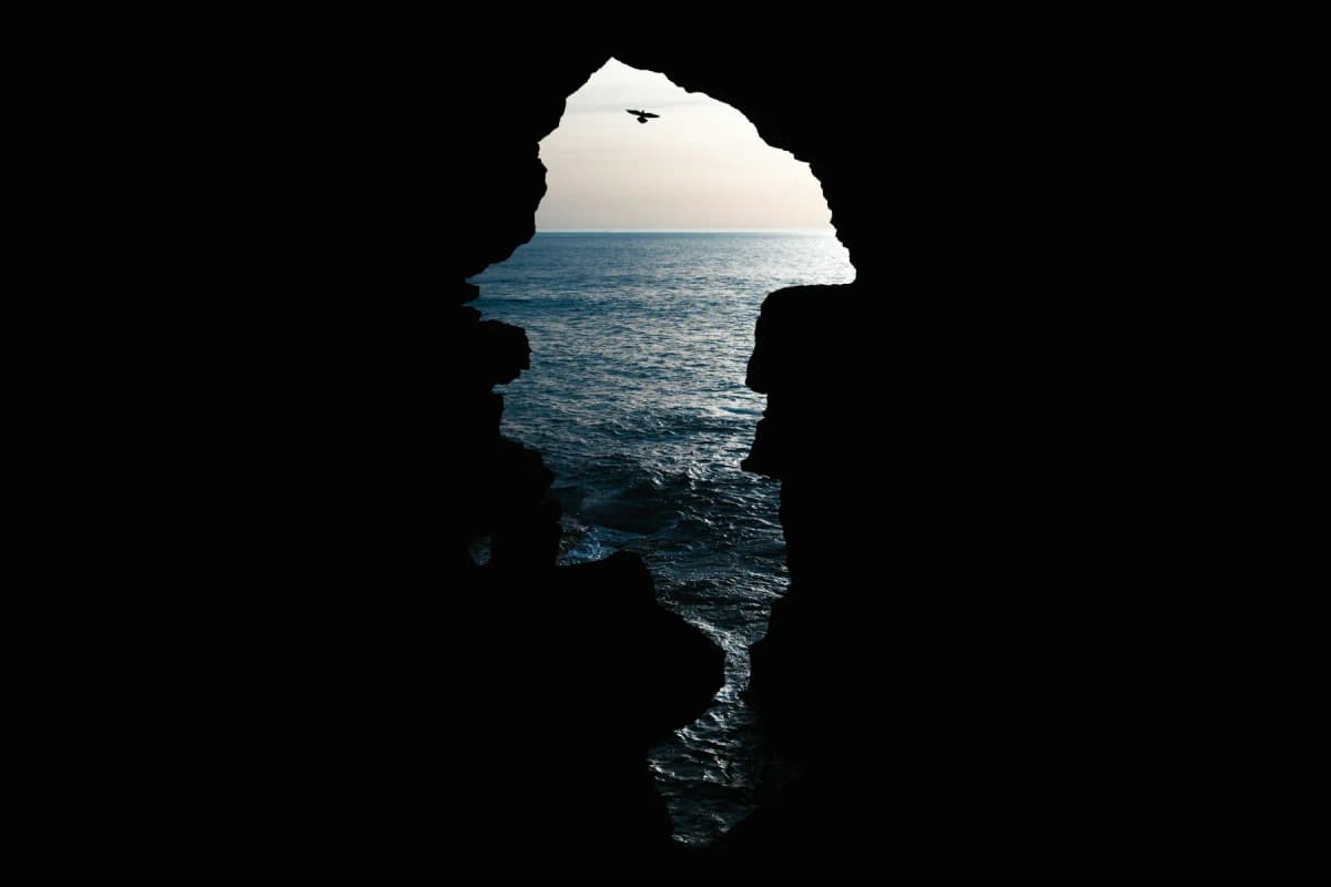 The sea seen through the Africa-shaped opening of the Caves of Hercules near Tangier