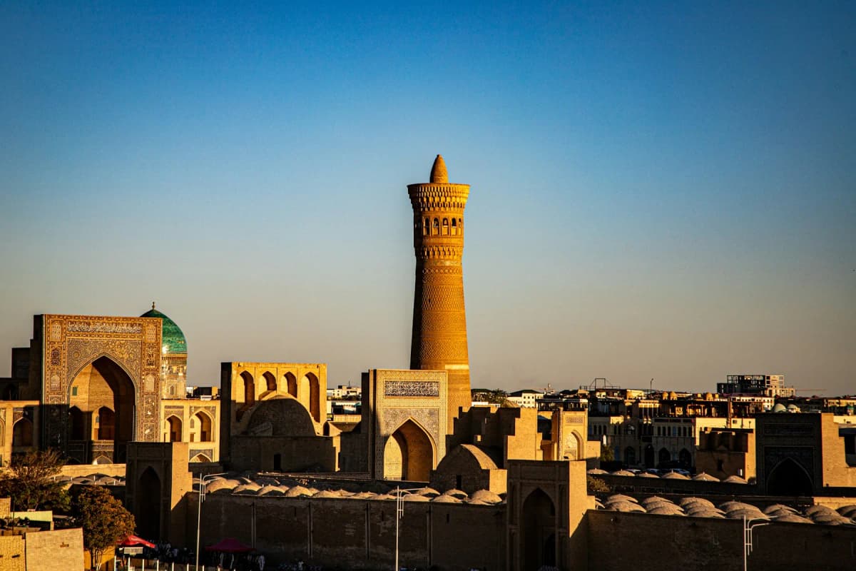 The Kalyan Minaret rising above the old town of Bukhara in the late afternoon sun