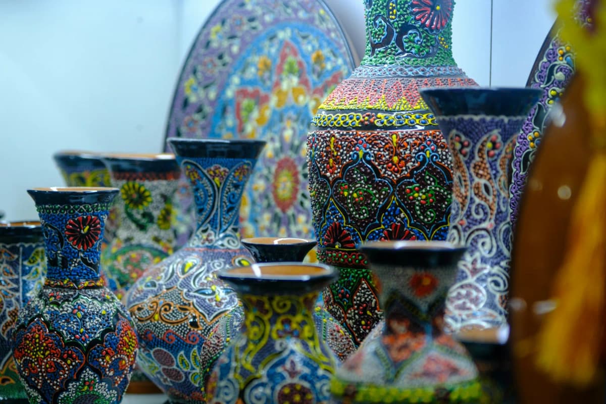 Uzbekistan itinerary: hand-painted Uzbek ceramic vases decorated in blue, turquoise and gold