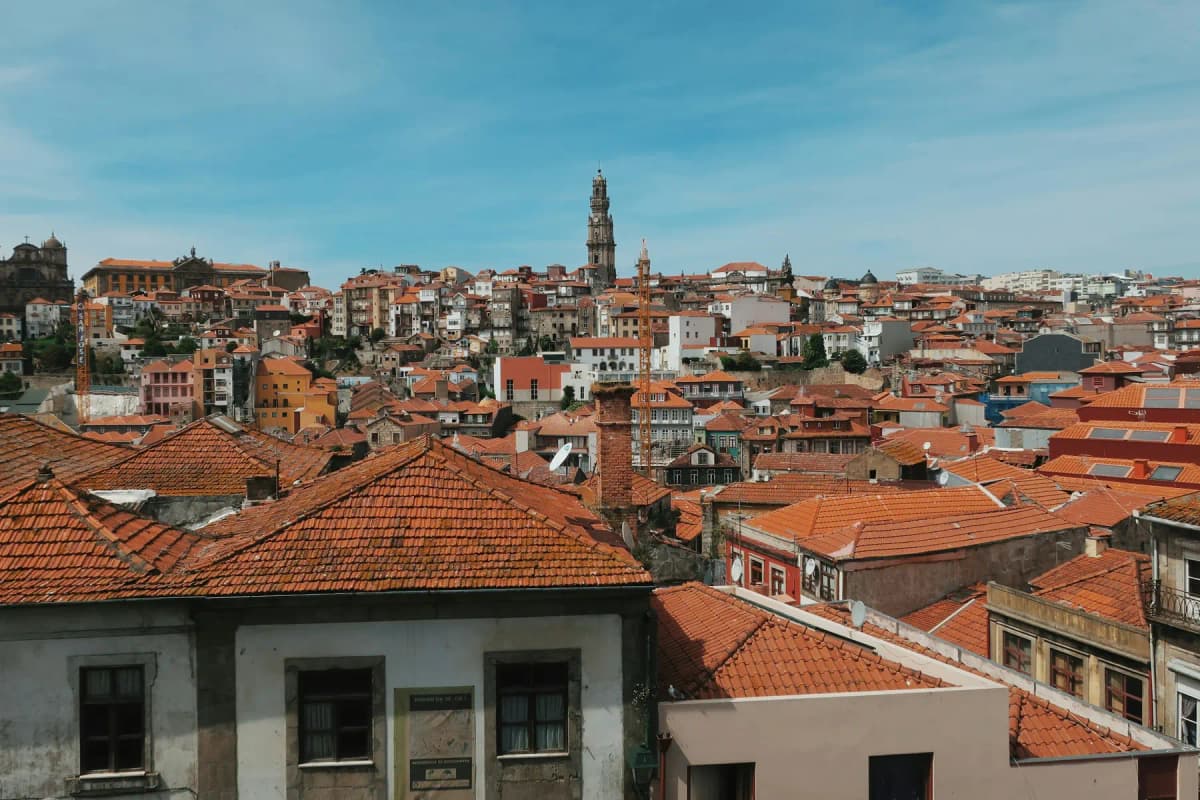 View across the orange rooftops of Porto from the Sé to the Clérigos Tower