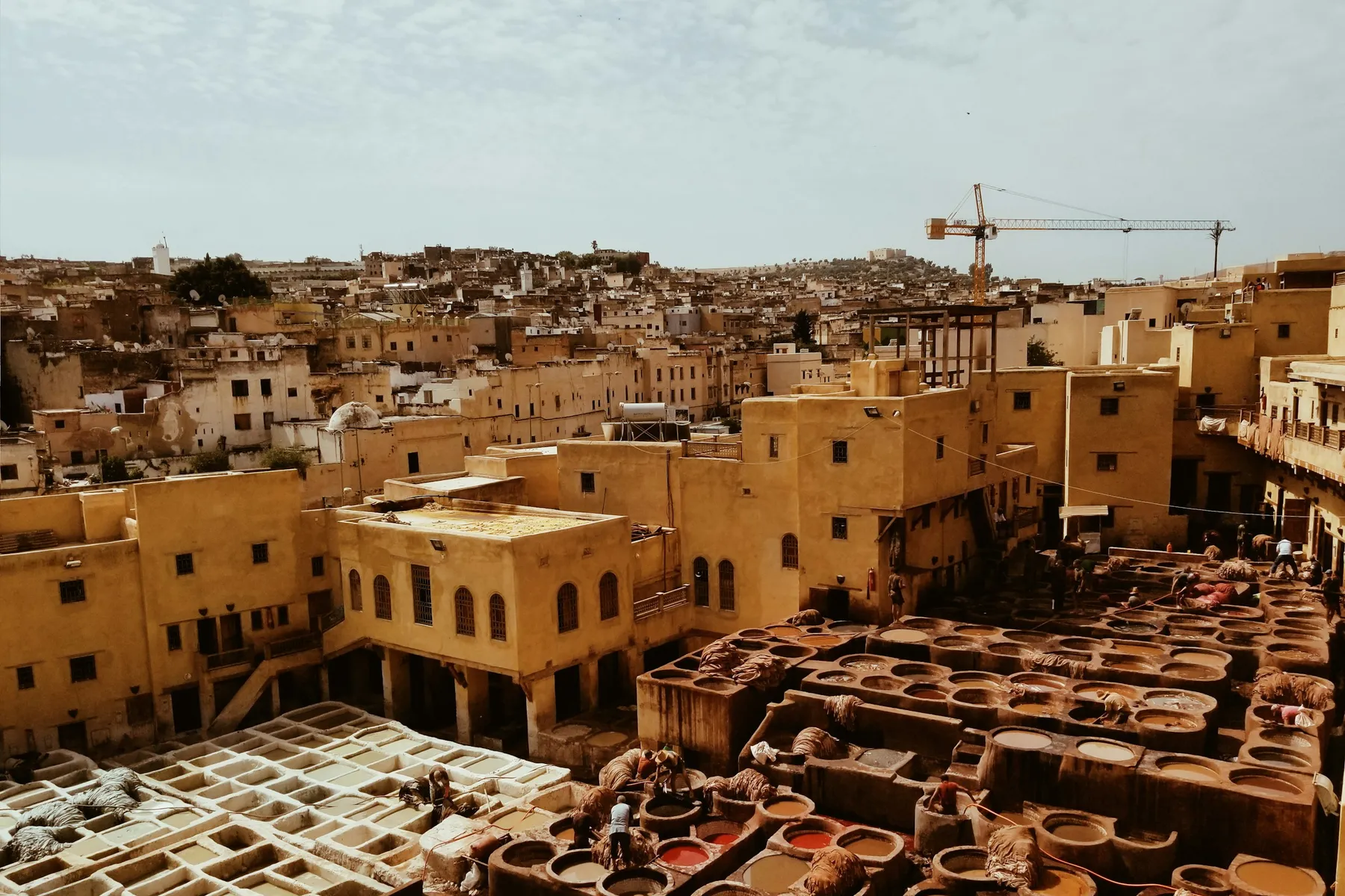 Rows of stone dye vats at the Chouara tannery in the Fes medina