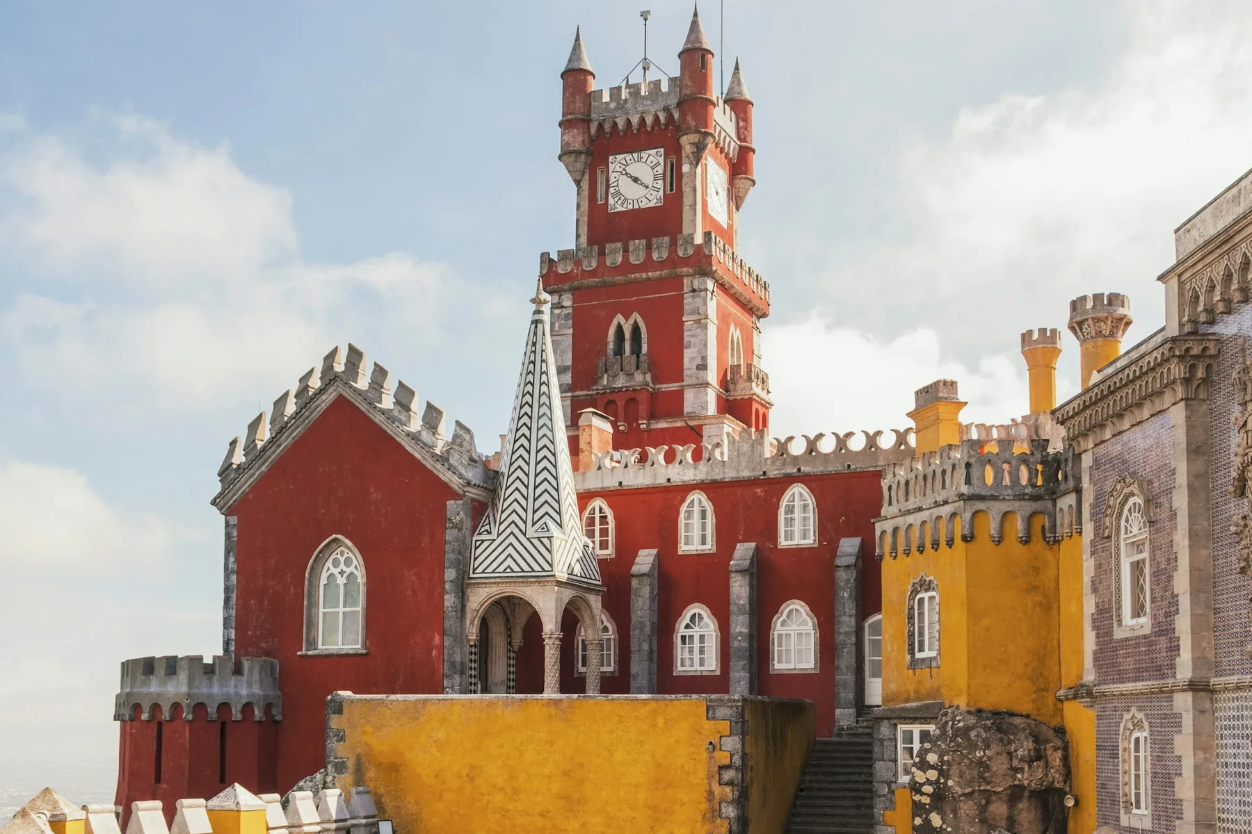 The colourful Pena Palace on a forested hilltop above Sintra, Portugal